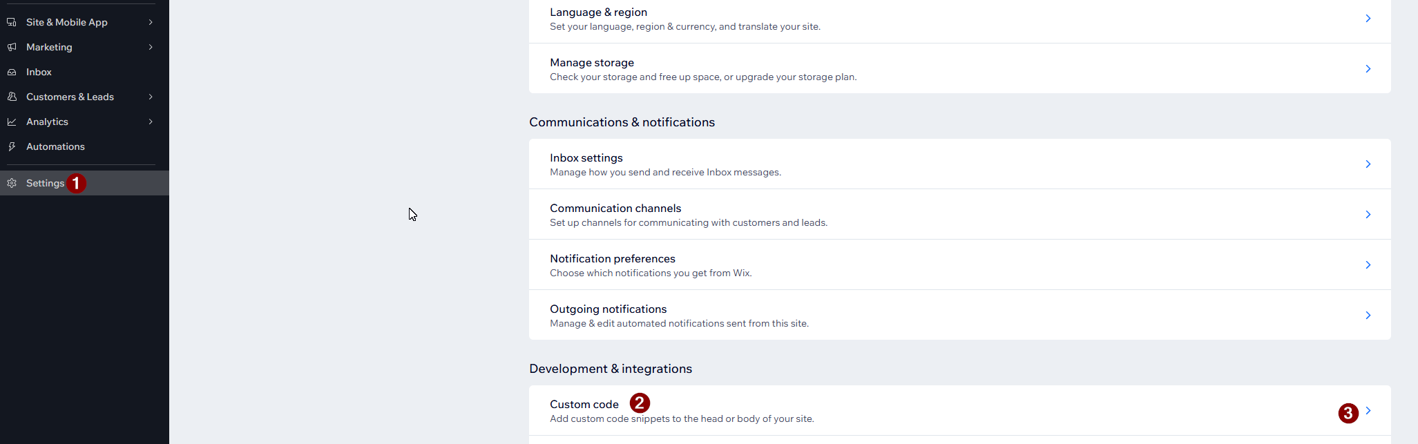 Wix Settings page showing Development and integrations with the Custom code option highlighted